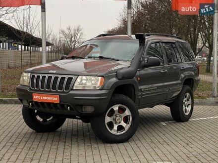 Сірий Джип Grand Cherokee, об'ємом двигуна 4.7 л та пробігом 158 тис. км за 7900 $, фото 1 на Automoto.ua