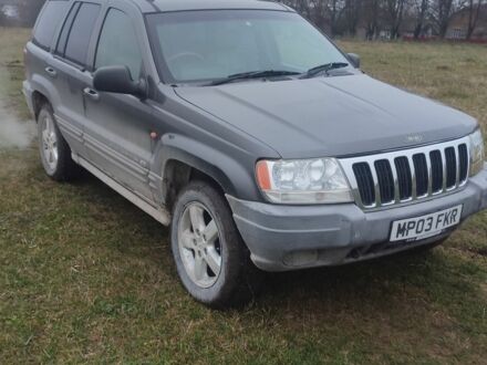 Серый Джип Гранд Чероки, объемом двигателя 2.7 л и пробегом 300 тыс. км за 3574 $, фото 1 на Automoto.ua