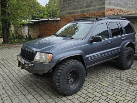 Серый Джип Гранд Чероки, объемом двигателя 4.7 л и пробегом 219 тыс. км за 9000 $, фото 1 на Automoto.ua