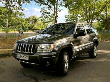 Сірий Джип Grand Cherokee, об'ємом двигуна 2.7 л та пробігом 295 тис. км за 8900 $, фото 1 на Automoto.ua