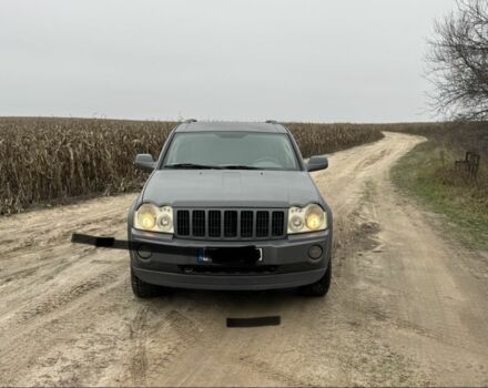 Серый Джип Гранд Чероки, объемом двигателя 3 л и пробегом 416 тыс. км за 5000 $, фото 1 на Automoto.ua