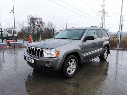 Сірий Джип Grand Cherokee, об'ємом двигуна 5.7 л та пробігом 271 тис. км за 11000 $, фото 1 на Automoto.ua