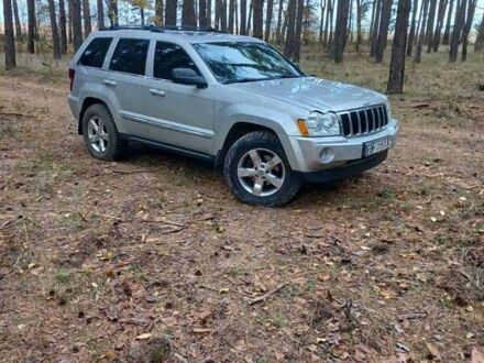 Серый Джип Гранд Чероки, объемом двигателя 5.65 л и пробегом 171 тыс. км за 10800 $, фото 1 на Automoto.ua
