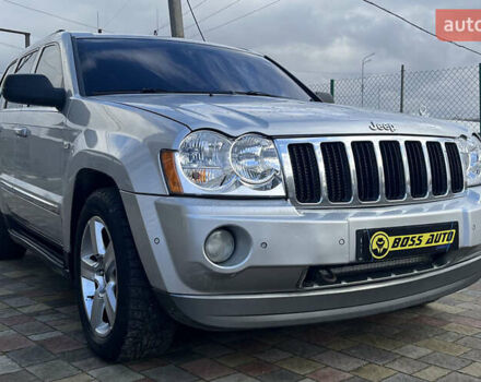 Серый Джип Гранд Чероки, объемом двигателя 5.65 л и пробегом 244 тыс. км за 9200 $, фото 1 на Automoto.ua