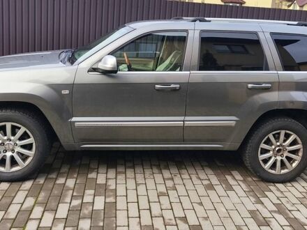 Сірий Джип Grand Cherokee, об'ємом двигуна 2.99 л та пробігом 245 тис. км за 10800 $, фото 1 на Automoto.ua