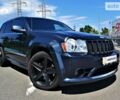 Сірий Джип Grand Cherokee, об'ємом двигуна 6.1 л та пробігом 162 тис. км за 23999 $, фото 1 на Automoto.ua