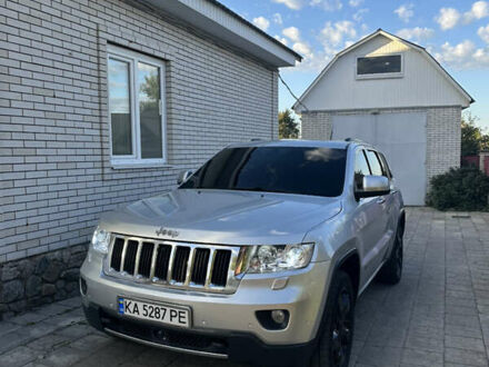 Сірий Джип Grand Cherokee, об'ємом двигуна 3 л та пробігом 196 тис. км за 15500 $, фото 1 на Automoto.ua