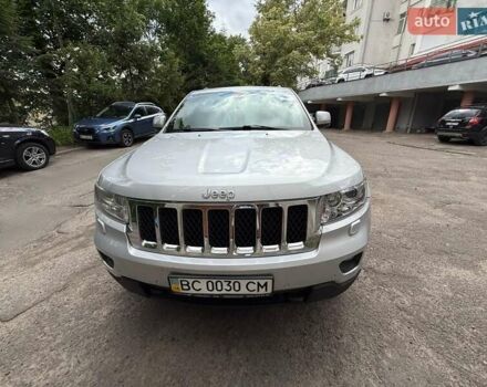 Серый Джип Гранд Чероки, объемом двигателя 3 л и пробегом 205 тыс. км за 13500 $, фото 1 на Automoto.ua