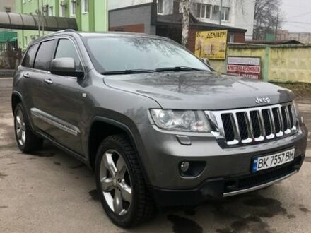 Серый Джип Гранд Чероки, объемом двигателя 3 л и пробегом 232 тыс. км за 14000 $, фото 1 на Automoto.ua