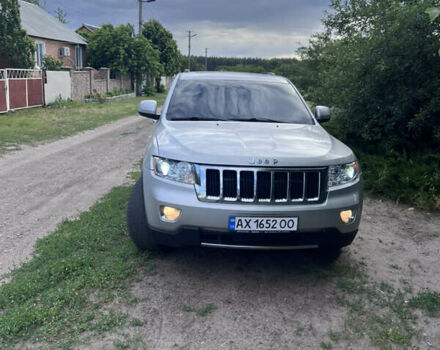 Сірий Джип Grand Cherokee, об'ємом двигуна 2.99 л та пробігом 210 тис. км за 15999 $, фото 1 на Automoto.ua