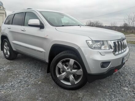 Сірий Джип Grand Cherokee, об'ємом двигуна 3 л та пробігом 265 тис. км за 17302 $, фото 1 на Automoto.ua