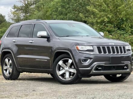 Серый Джип Гранд Чероки, объемом двигателя 3 л и пробегом 84 тыс. км за 14000 $, фото 1 на Automoto.ua