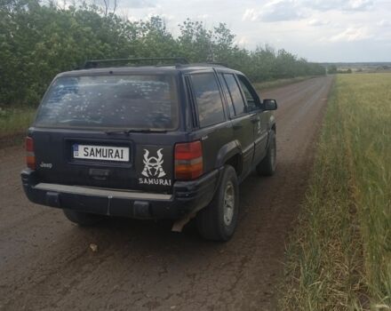 Синій Джип Grand Cherokee, об'ємом двигуна 5 л та пробігом 313 тис. км за 5933 $, фото 2 на Automoto.ua