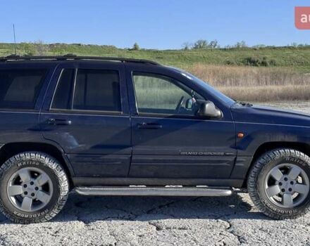 Синій Джип Grand Cherokee, об'ємом двигуна 3.12 л та пробігом 355 тис. км за 7000 $, фото 3 на Automoto.ua