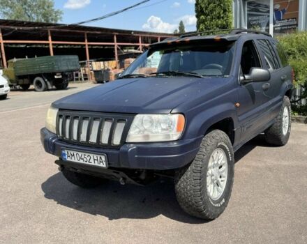 Синий Джип Гранд Чероки, объемом двигателя 3.1 л и пробегом 285 тыс. км за 5500 $, фото 2 на Automoto.ua