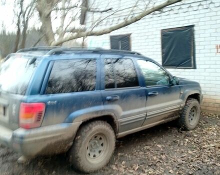 Синий Джип Гранд Чероки, объемом двигателя 3 л и пробегом 300 тыс. км за 4000 $, фото 3 на Automoto.ua