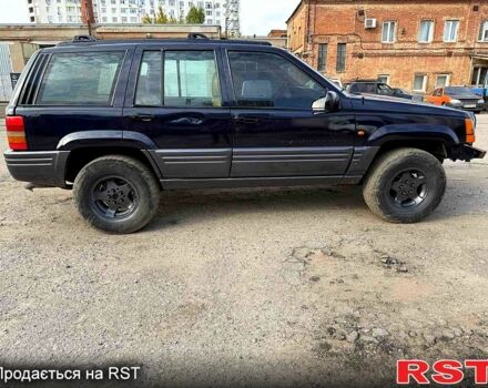 Синий Джип Гранд Чероки, объемом двигателя 3 л и пробегом 290 тыс. км за 2900 $, фото 4 на Automoto.ua