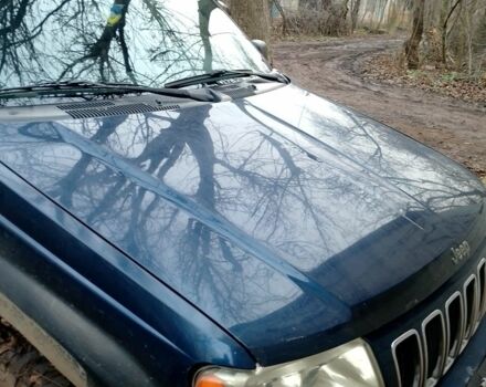 Синий Джип Гранд Чероки, объемом двигателя 3 л и пробегом 300 тыс. км за 4000 $, фото 2 на Automoto.ua