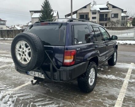 Синий Джип Гранд Чероки, объемом двигателя 3 л и пробегом 234 тыс. км за 3600 $, фото 4 на Automoto.ua