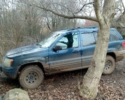Синий Джип Гранд Чероки, объемом двигателя 3 л и пробегом 300 тыс. км за 4000 $, фото 5 на Automoto.ua