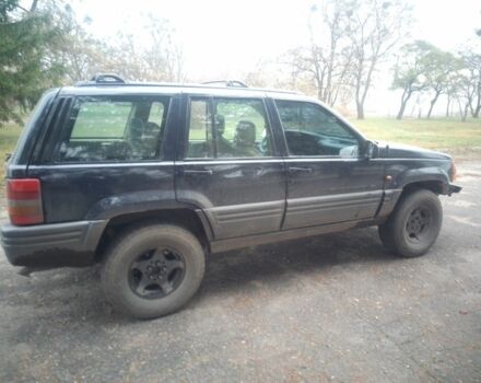 Синий Джип Гранд Чероки, объемом двигателя 2.5 л и пробегом 320 тыс. км за 2300 $, фото 2 на Automoto.ua