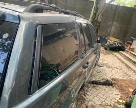 Синий Джип Гранд Чероки, объемом двигателя 4 л и пробегом 200 тыс. км за 3700 $, фото 5 на Automoto.ua