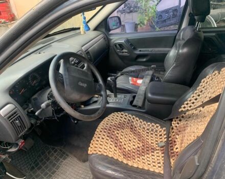 Синий Джип Гранд Чероки, объемом двигателя 4 л и пробегом 200 тыс. км за 3700 $, фото 3 на Automoto.ua