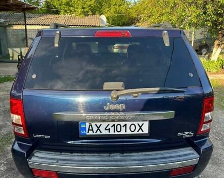 Синий Джип Гранд Чероки, объемом двигателя 5.65 л и пробегом 198 тыс. км за 11500 $, фото 2 на Automoto.ua
