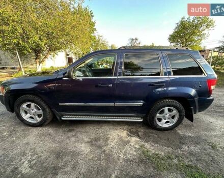 Синий Джип Гранд Чероки, объемом двигателя 5.65 л и пробегом 198 тыс. км за 11500 $, фото 4 на Automoto.ua