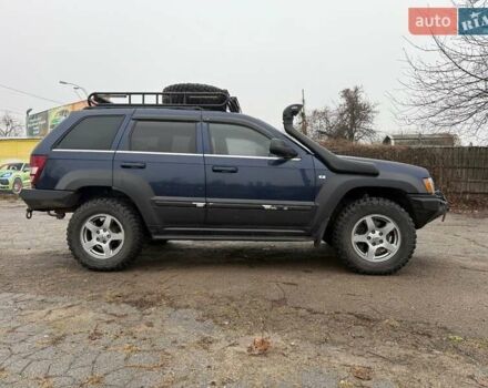 Синий Джип Гранд Чероки, объемом двигателя 5.65 л и пробегом 230 тыс. км за 15900 $, фото 3 на Automoto.ua