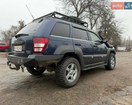 Синий Джип Гранд Чероки, объемом двигателя 5.65 л и пробегом 230 тыс. км за 15900 $, фото 4 на Automoto.ua