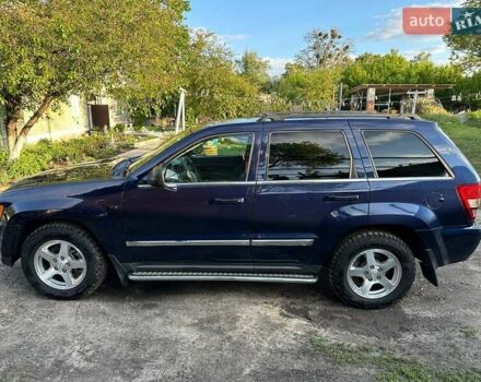 Синий Джип Гранд Чероки, объемом двигателя 5.65 л и пробегом 198 тыс. км за 11500 $, фото 5 на Automoto.ua