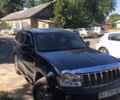 Синій Джип Grand Cherokee, об'ємом двигуна 5.65 л та пробігом 230 тис. км за 13000 $, фото 4 на Automoto.ua