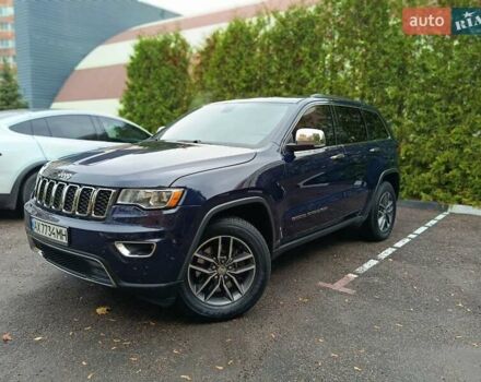 Синий Джип Гранд Чероки, объемом двигателя 5.65 л и пробегом 128 тыс. км за 27400 $, фото 2 на Automoto.ua