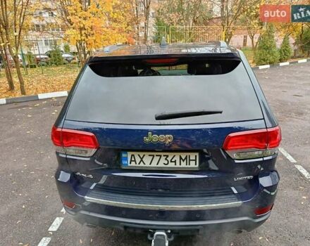 Синий Джип Гранд Чероки, объемом двигателя 5.65 л и пробегом 128 тыс. км за 27400 $, фото 6 на Automoto.ua