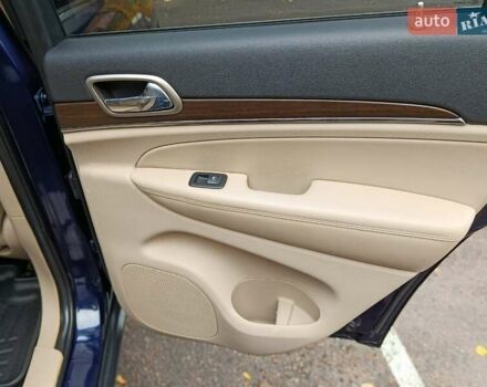 Синий Джип Гранд Чероки, объемом двигателя 5.65 л и пробегом 128 тыс. км за 27400 $, фото 21 на Automoto.ua