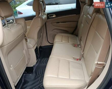 Синий Джип Гранд Чероки, объемом двигателя 5.65 л и пробегом 128 тыс. км за 27400 $, фото 18 на Automoto.ua