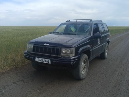 Синій Джип Grand Cherokee, об'ємом двигуна 5 л та пробігом 313 тис. км за 5933 $, фото 1 на Automoto.ua