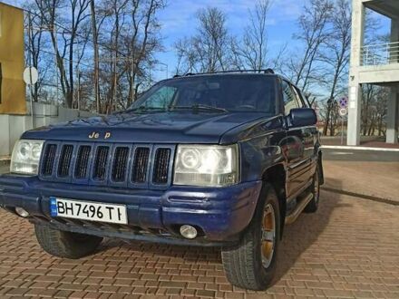 Синій Джип Grand Cherokee, об'ємом двигуна 4 л та пробігом 553 тис. км за 5300 $, фото 1 на Automoto.ua