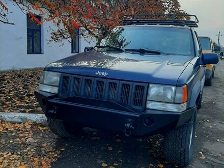 Синій Джип Grand Cherokee, об'ємом двигуна 2.5 л та пробігом 100 тис. км за 6000 $, фото 1 на Automoto.ua