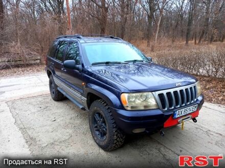 Синій Джип Grand Cherokee, об'ємом двигуна 4 л та пробігом 405 тис. км за 11900 $, фото 1 на Automoto.ua