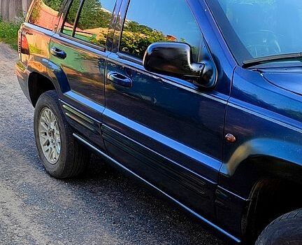 Синій Джип Grand Cherokee, об'ємом двигуна 3 л та пробігом 378 тис. км за 2300 $, фото 1 на Automoto.ua