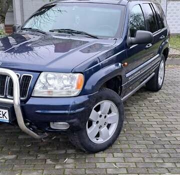 Синій Джип Grand Cherokee, об'ємом двигуна 3.1 л та пробігом 247 тис. км за 7500 $, фото 1 на Automoto.ua