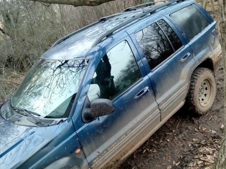 Синий Джип Гранд Чероки, объемом двигателя 3 л и пробегом 300 тыс. км за 4000 $, фото 1 на Automoto.ua