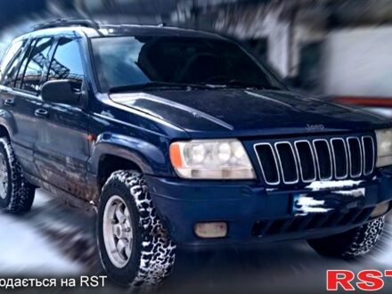 Синій Джип Grand Cherokee, об'ємом двигуна 3.1 л та пробігом 320 тис. км за 4420 $, фото 1 на Automoto.ua