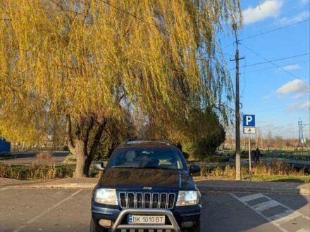 Синий Джип Гранд Чероки, объемом двигателя 4.7 л и пробегом 230 тыс. км за 6350 $, фото 1 на Automoto.ua