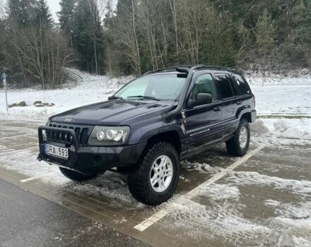 Синий Джип Гранд Чероки, объемом двигателя 3 л и пробегом 234 тыс. км за 3600 $, фото 1 на Automoto.ua