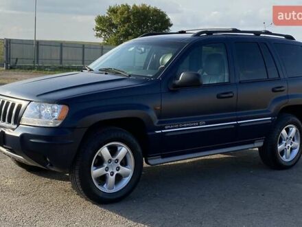 Синий Джип Гранд Чероки, объемом двигателя 2.69 л и пробегом 145 тыс. км за 9000 $, фото 1 на Automoto.ua