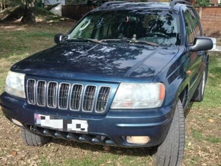 Синій Джип Grand Cherokee, об'ємом двигуна 2.7 л та пробігом 320 тис. км за 3309 $, фото 1 на Automoto.ua