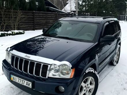Синий Джип Гранд Чероки, объемом двигателя 5.7 л и пробегом 247 тыс. км за 12000 $, фото 1 на Automoto.ua
